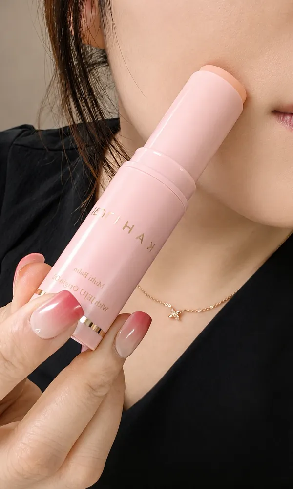 KAHI multi balm stick applied to the cheek during a Korean beauty product review