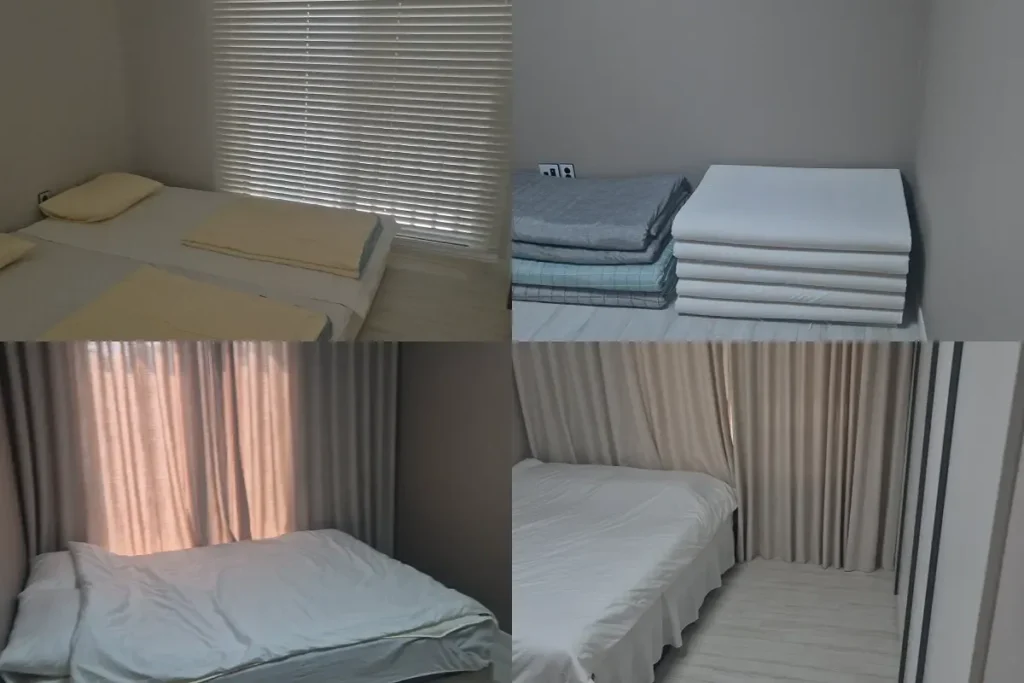 Bedroom and sleeping areas inside a Korean pension with beds, floor mats, and curtains.
