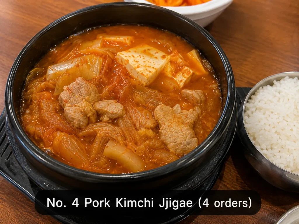 Pork kimchi jjigae served with rice, ranked No. 4 with 4 orders.